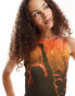 ASOS DESIGN mesh tank top with music festival graphic in orange