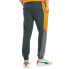 Фото #2 товара Puma International Drawstring Pants Mens Green Casual Athletic Bottoms 53157880