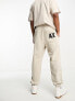 Armani Exchange logo joggers in beige mix and match