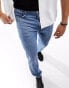 ASOS DESIGN straight jeans in authentic vintage wash in mid wash blue