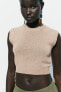 Knit top with contrast topstitching