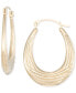 ფოტო #1 პროდუქტის Diamond Cut Oval Hoop Earrings in 10k Yellow Gold
