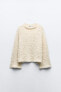 Textured knit sweater