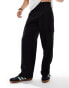 Фото #1 товара ASOS DESIGN smart wide leg cargo trousers with toggle hem in black