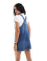 Фото #4 товара Tommy Jeans retro flag denim dungaree dress in mid wash