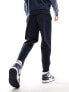 ASOS DESIGN tapered scuba joggers in navy