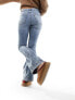 Фото #1 товара River Island tummy hold flare jeans in medium blue