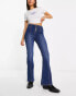 DTT Travis high waisted wide leg jean with button front in washed blue