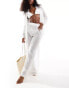 Threadbare beach trousers in white