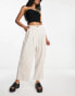 Фото #1 товара ASOS DESIGN pleated tapered trousers with linen in stone